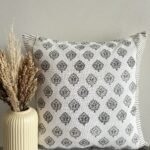 Hand block printed cotton slub cushion cover with grey tree motif pattern and striped border in neutral tones, 18x18 inches